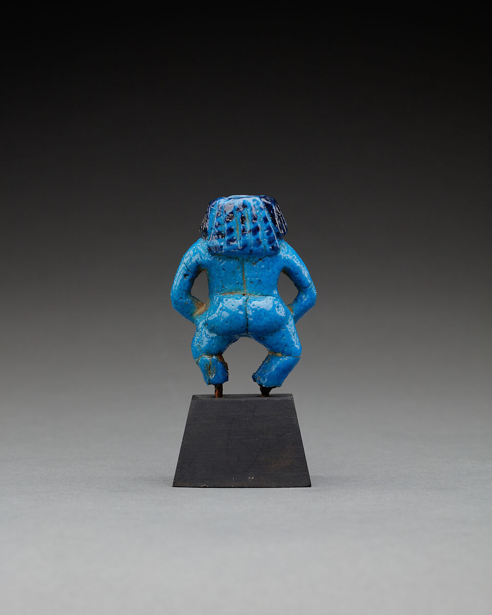 Container in the Form of a Female Dwarf, Faience