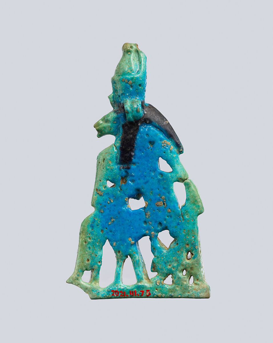 Lion-headed goddess suckling the king, Faience