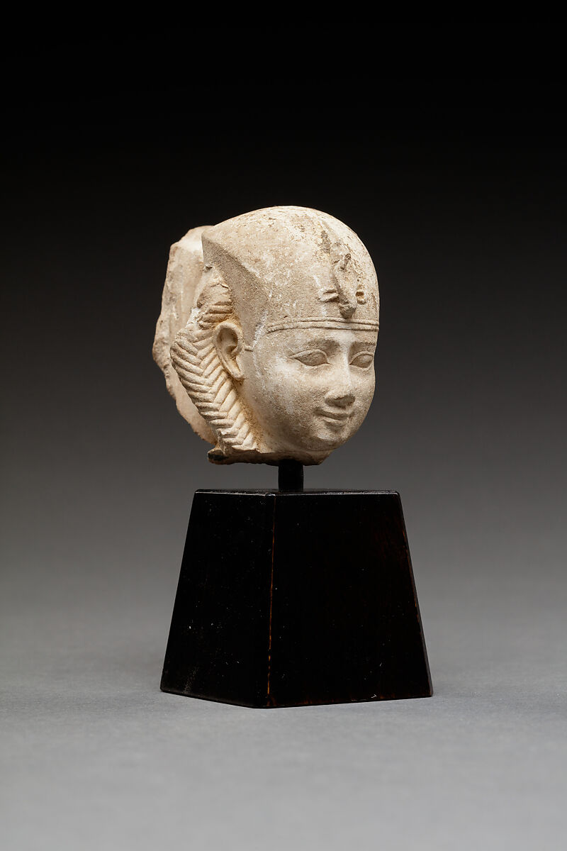 Head of a Harpokrates with a Blue Crown and Sidelock, Limestone