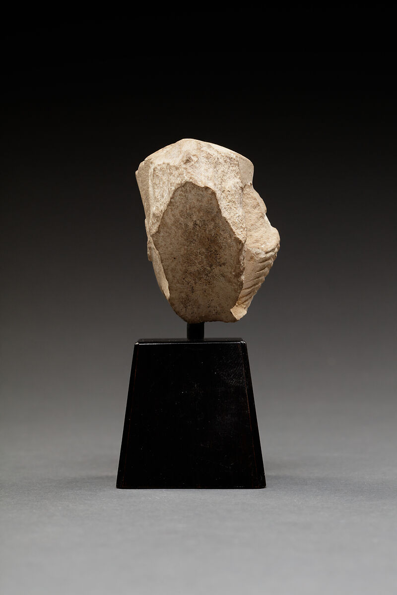 Head of a Harpokrates with a Blue Crown and Sidelock, Limestone