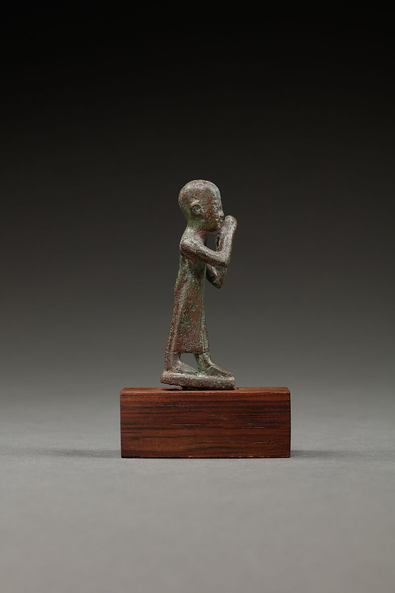 Statuette of a flutist, Copper alloy
