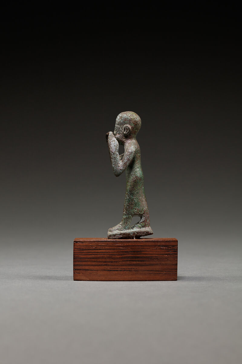 Statuette of a flutist, Copper alloy