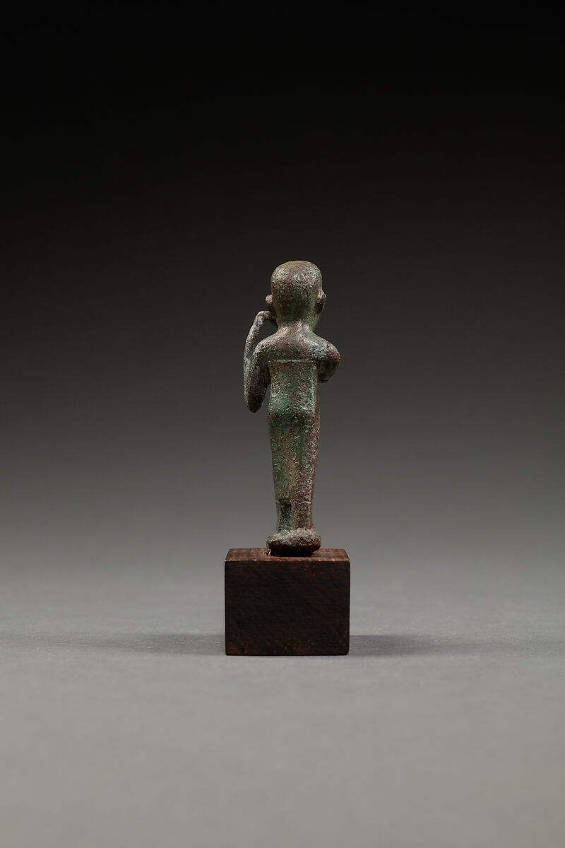 Statuette of a flutist, Copper alloy