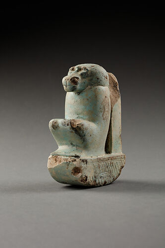 Figure of baboon on a basket and with a pillar, the shebet offering