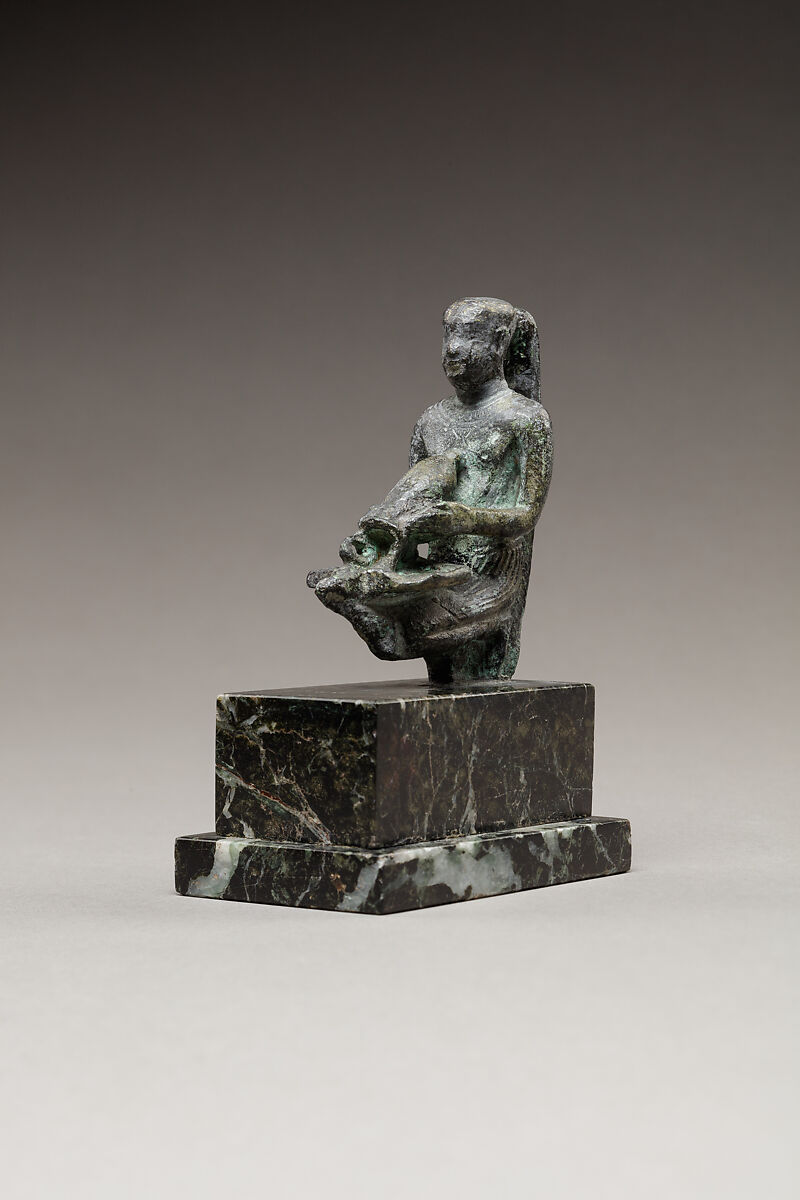 Pediese kneeling and pouring libation, Copper alloy 