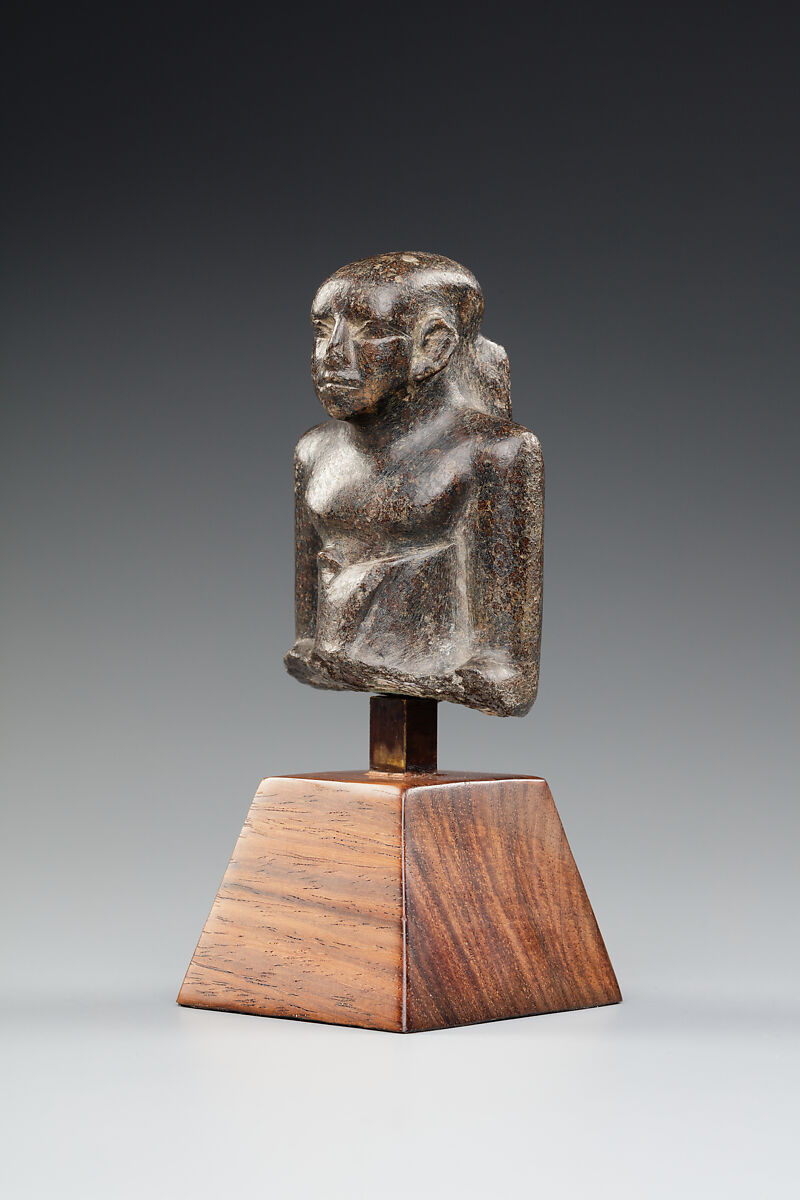 Upper Part of a Seated Figure in a Long Kilt, Serpentinite (?)