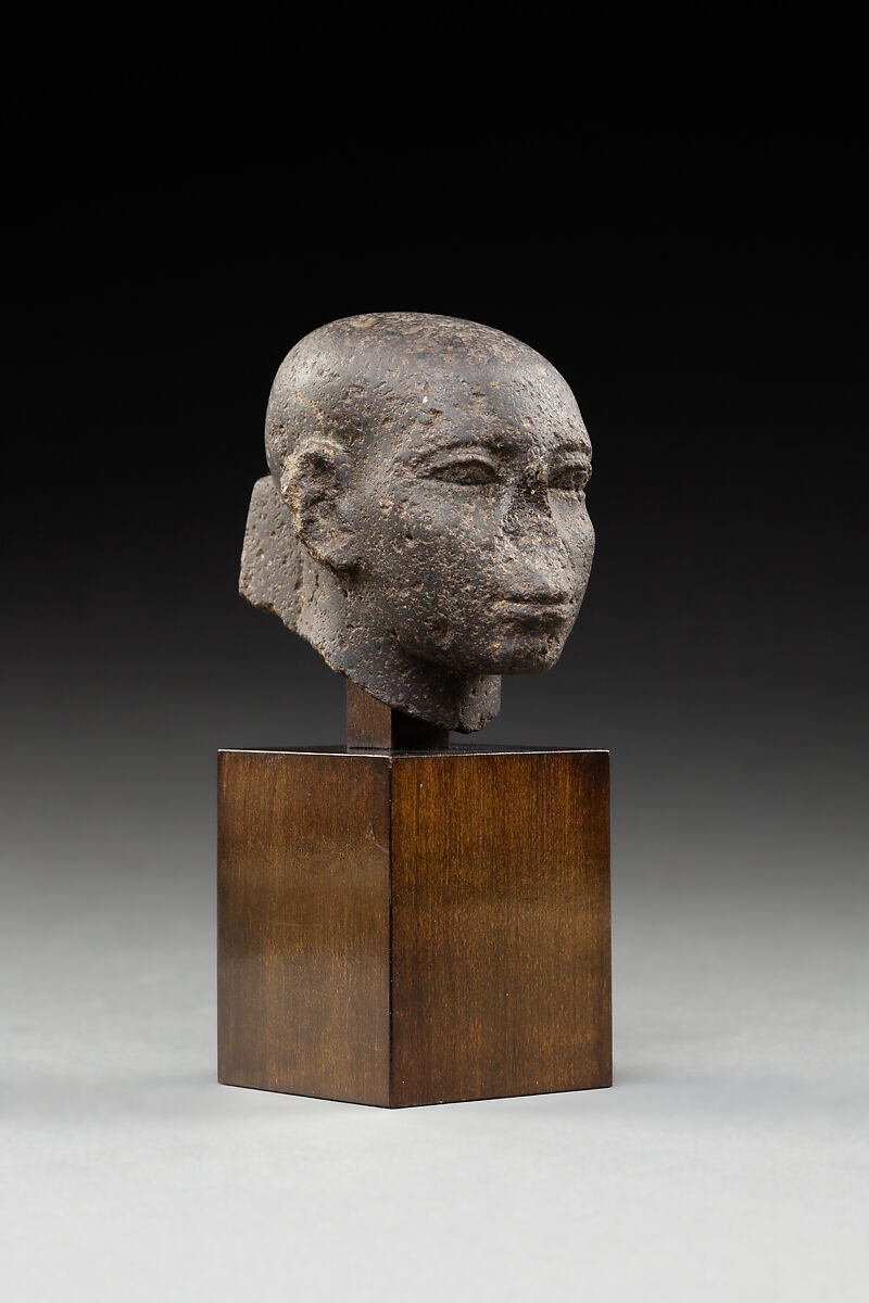 Head of a Man with a Shaved Head, Dense, gray-black hard stone