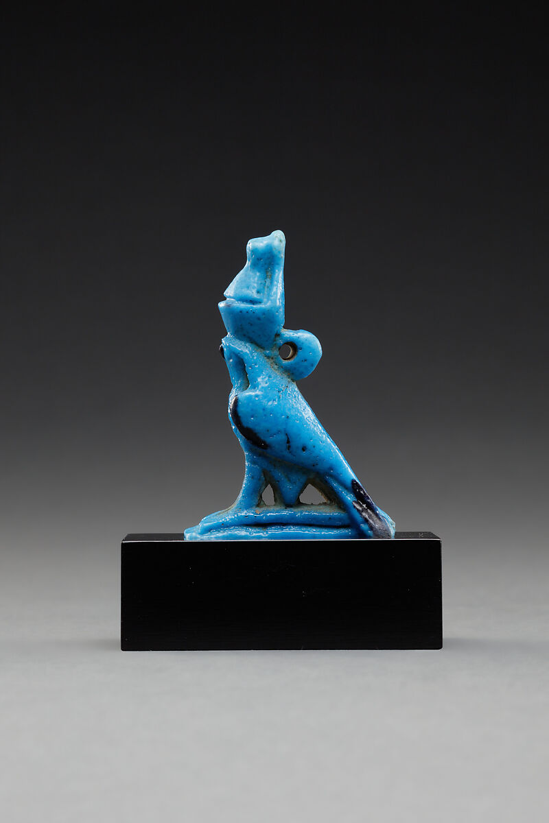 Horus amulet in the shape of a falcon with the double crown, Faience