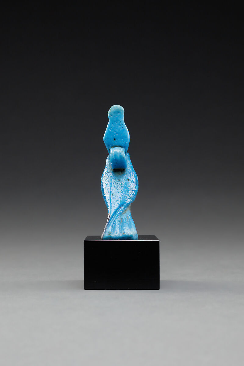Horus amulet in the shape of a falcon with the double crown, Faience