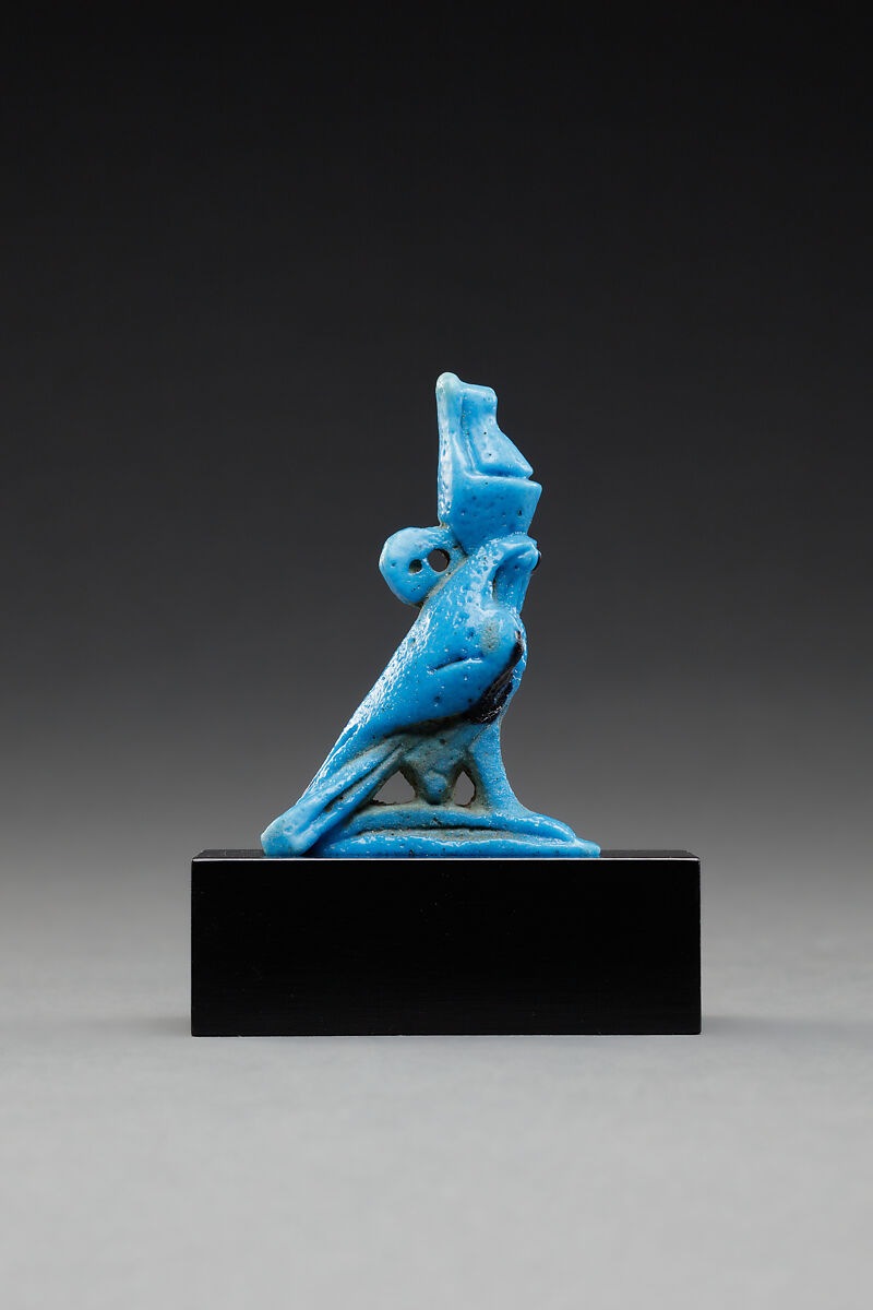 Horus amulet in the shape of a falcon with the double crown, Faience