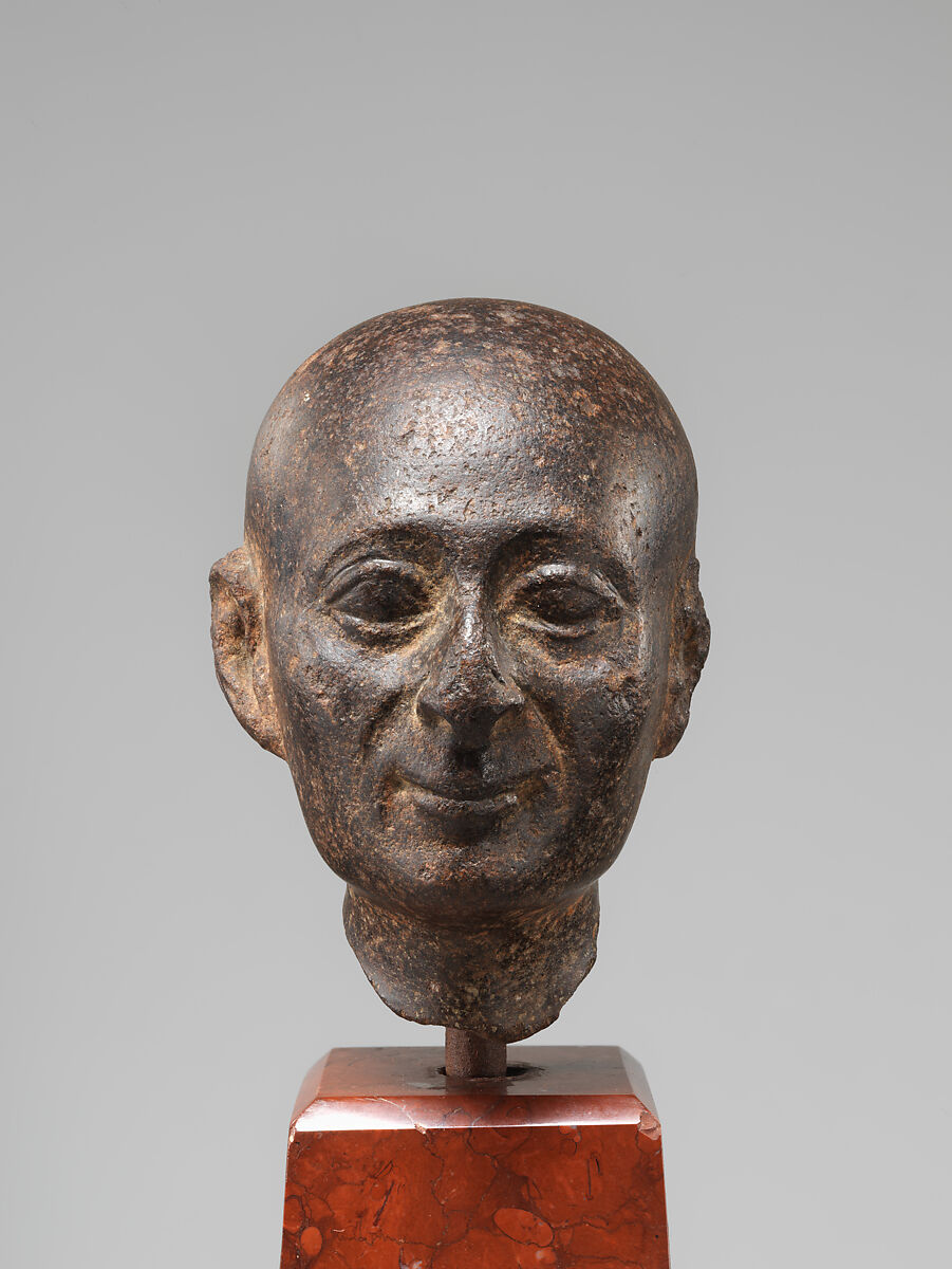 Man with a Shaved Head, Possibly red quartzite or basalt 