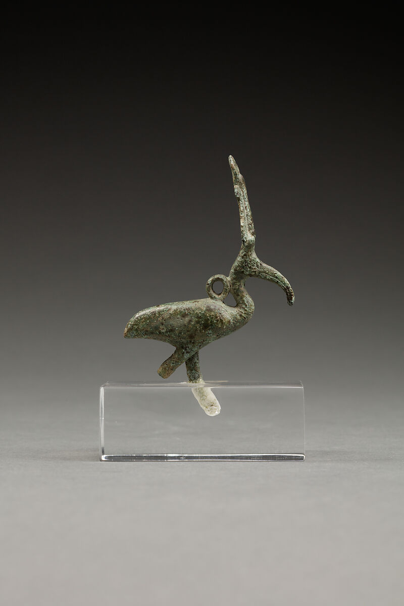 Pendant of an ibis wearing an atef crown, Cupreous metal