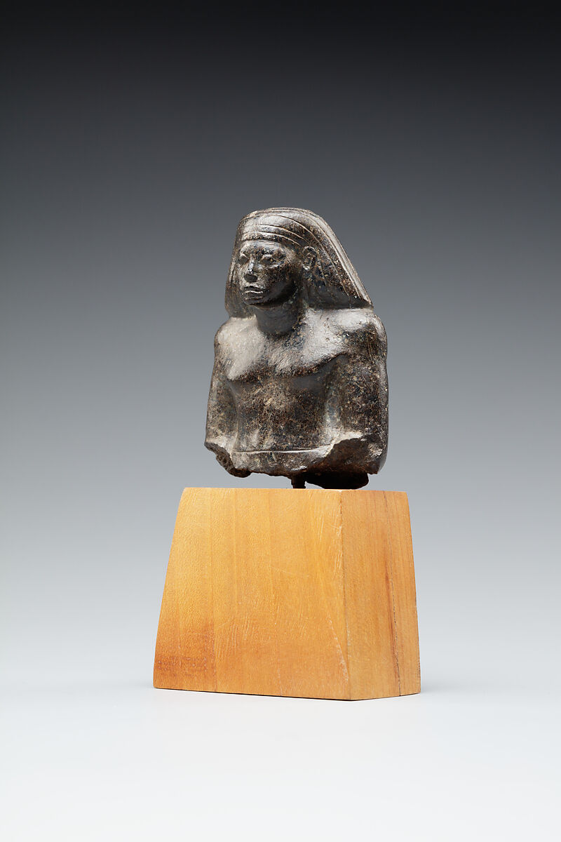 Upper part of a figure of a seated official, Steatite or serpentinite