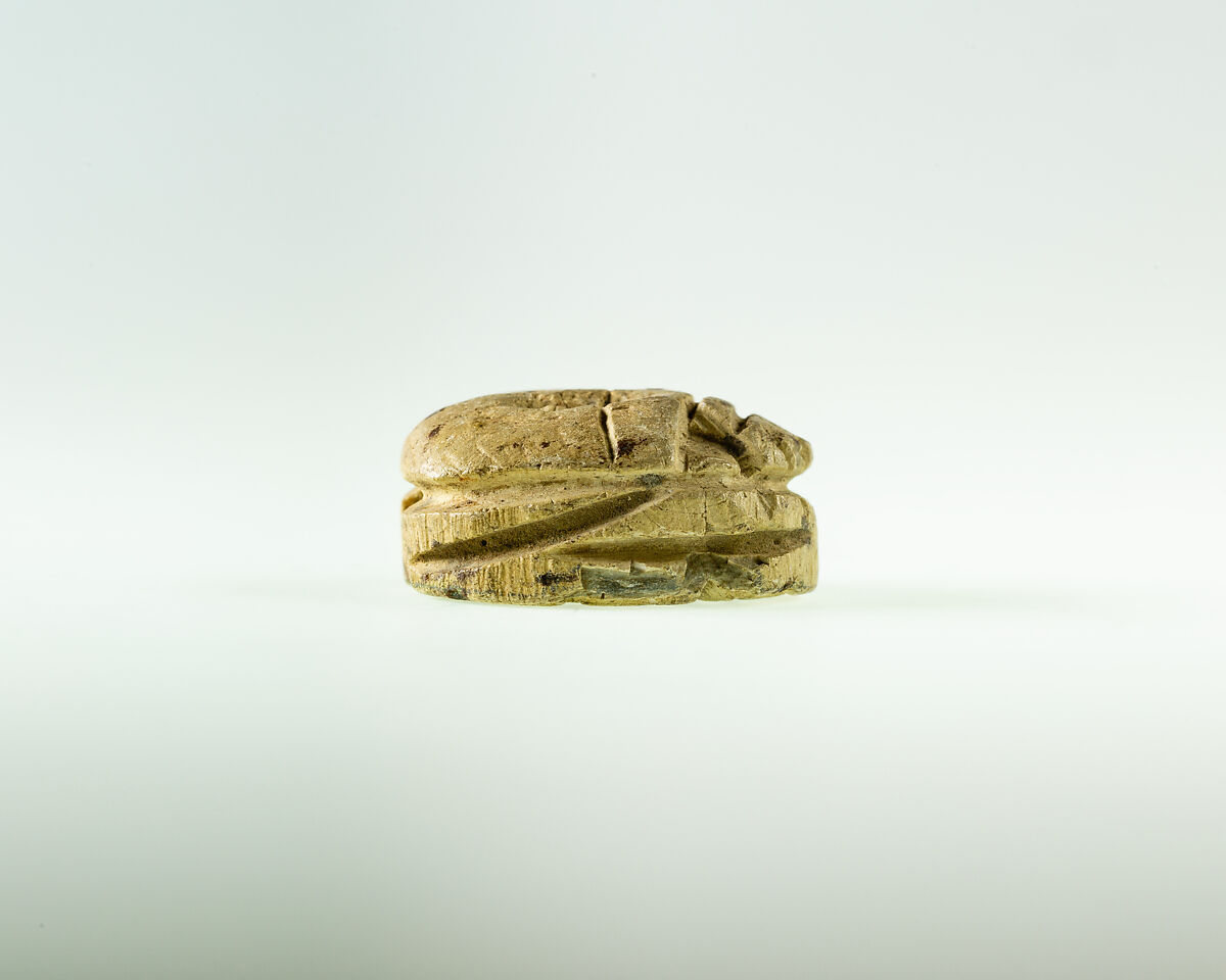 Scarab inscribed with the name Menkheperre, Steatite, traces of green glaze