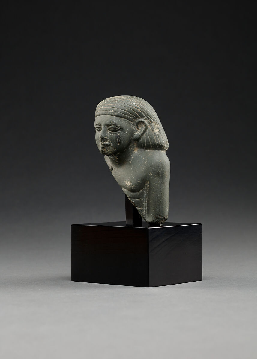 Upper part of a male seated figure, Fine-grained grey stone (graywacke?)