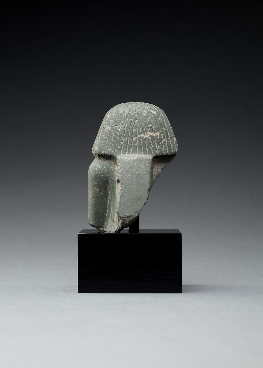 Upper part of a male seated figure, Fine-grained grey stone (graywacke?)