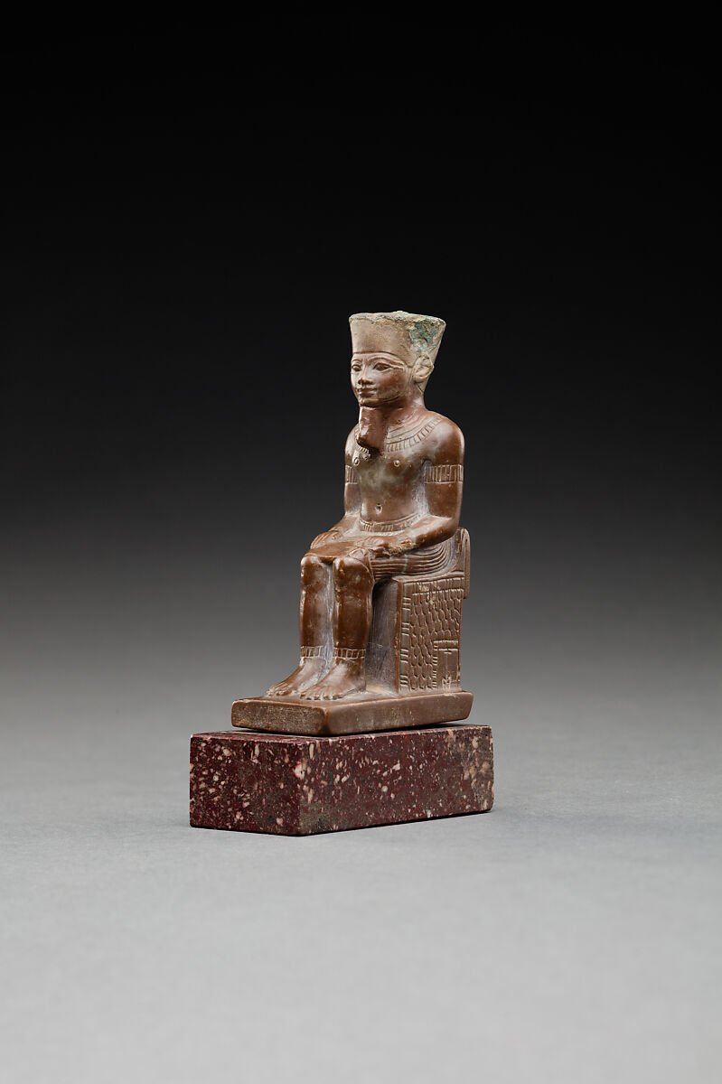 Seated figure of Amun, Limestone