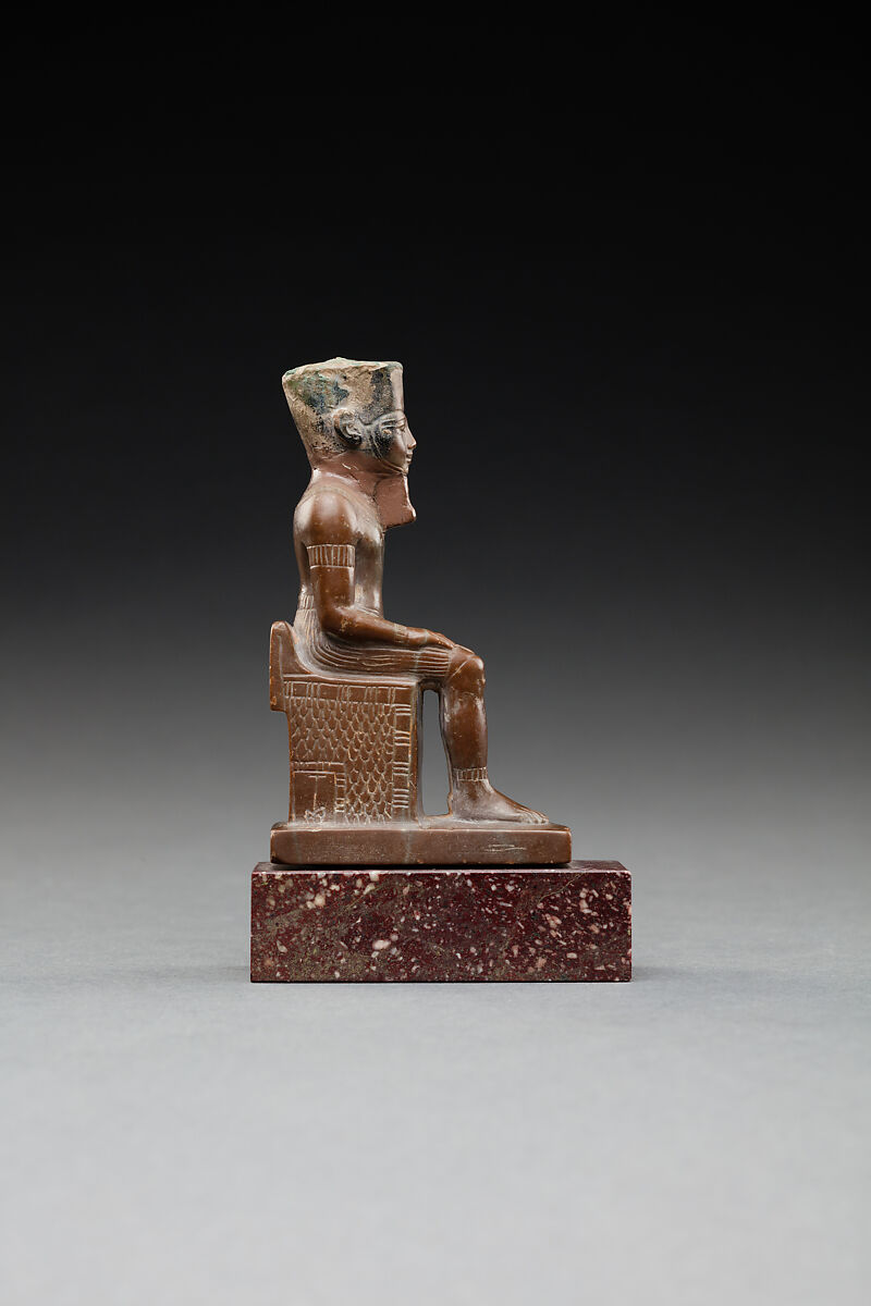 Seated figure of Amun, Limestone