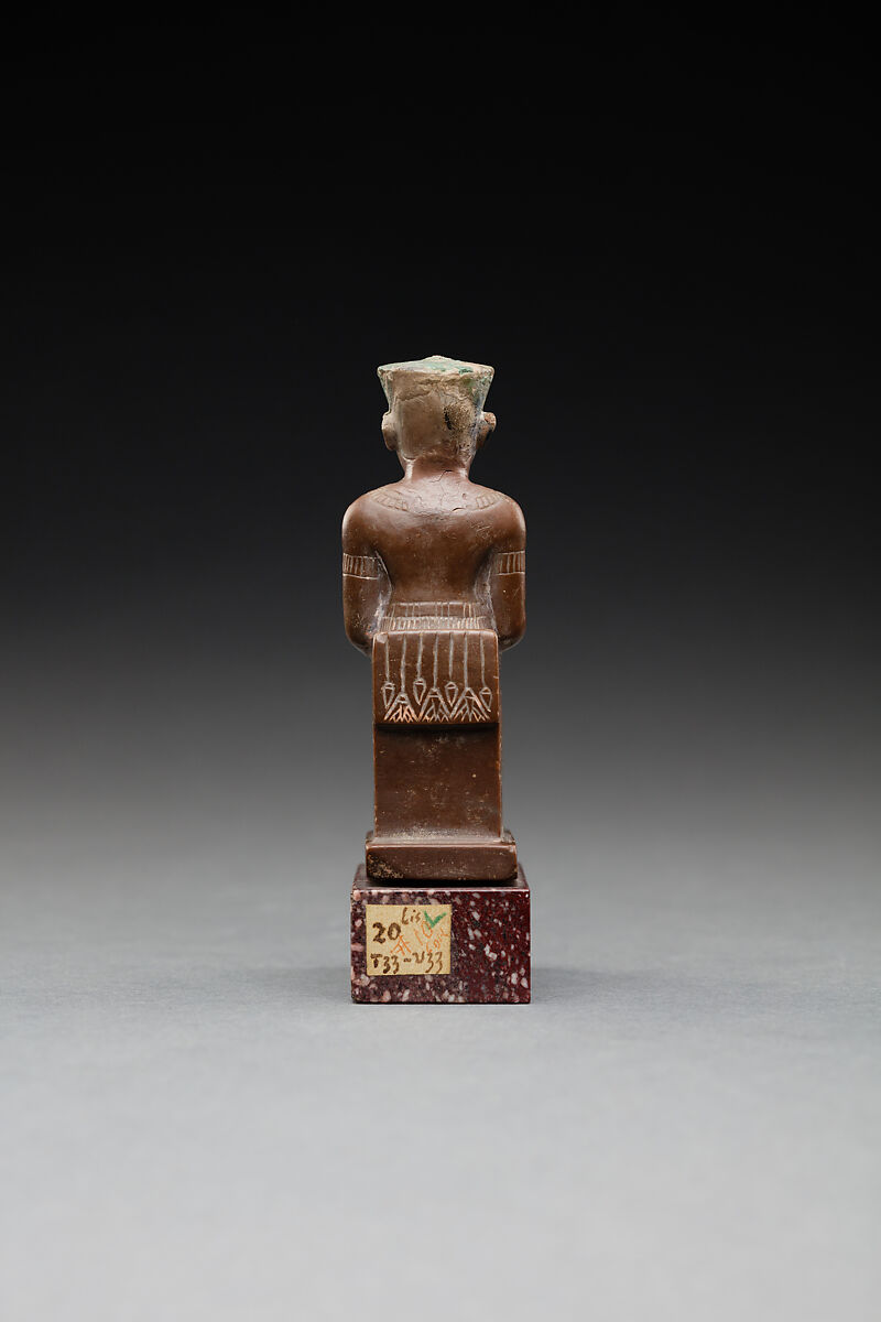 Seated figure of Amun, Limestone