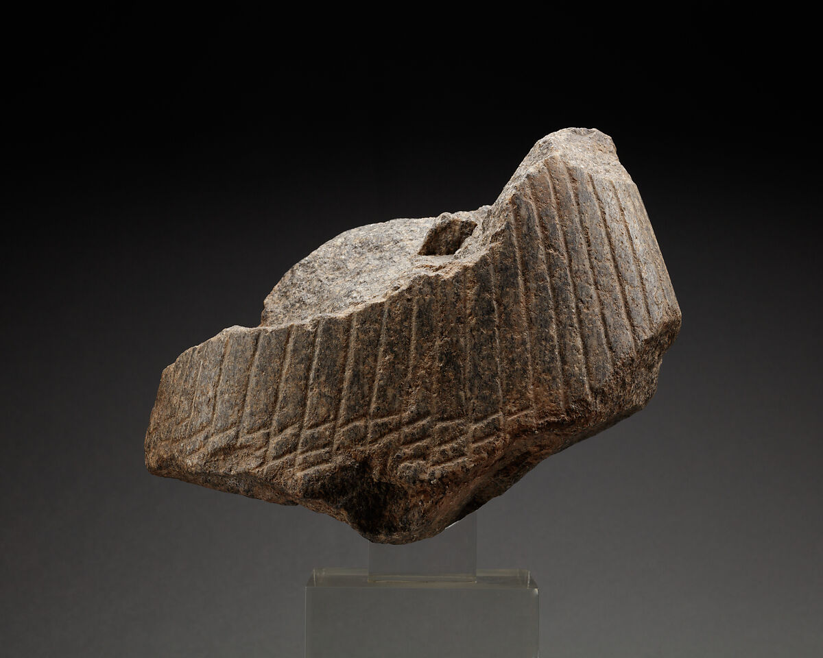 Fragmentary Head of a Man, Belonging to a Block Statue, Granodiorite