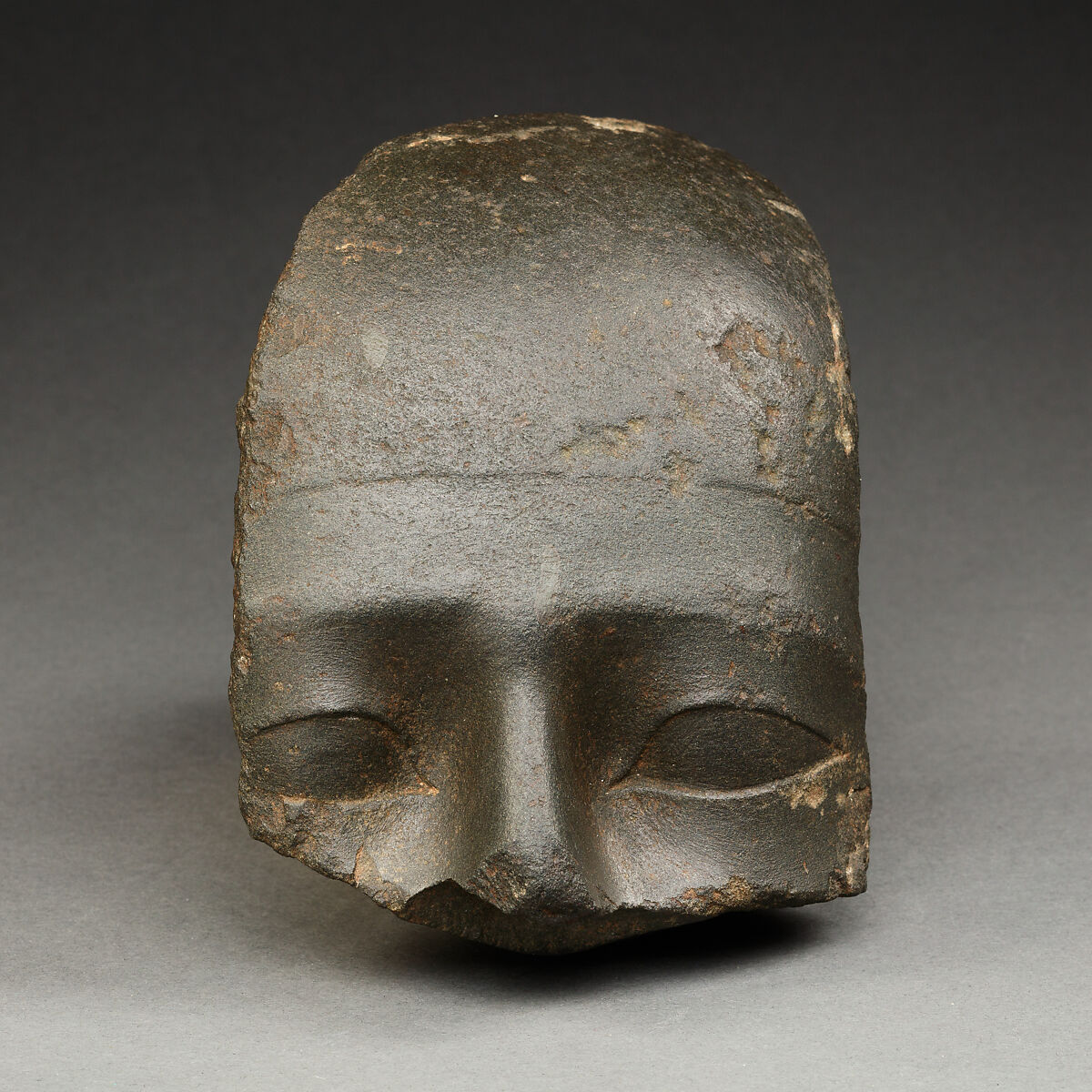 Upper Part of the Head of a Man, Basalt or graywacke 