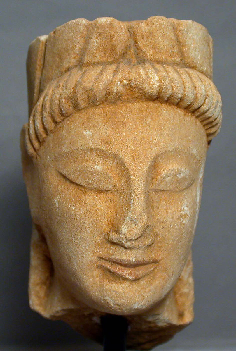 Limestone male head with wreath, Beige limestone, Cypriot 