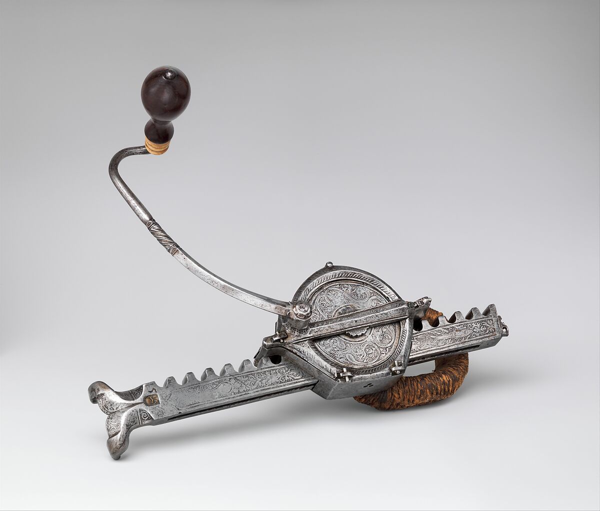 Crossbow (Halbe Rüstung) with Cranequin (Winder), Steel, wood (fruitwood, probably cherry and plum), staghorn, copper alloy, hemp, wool, probably German, possibly Saxony; cranequin, probably German