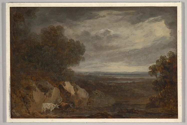 A wooded river landscape with cattle