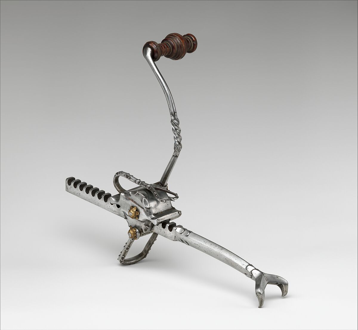Cranequin from the Armory of Emperor Maximilan I (reigned 1493/1508–19), Steel, wood (fruitwood, possibly pear), copper alloy, Western or Central European, the Netherlands or Austria 