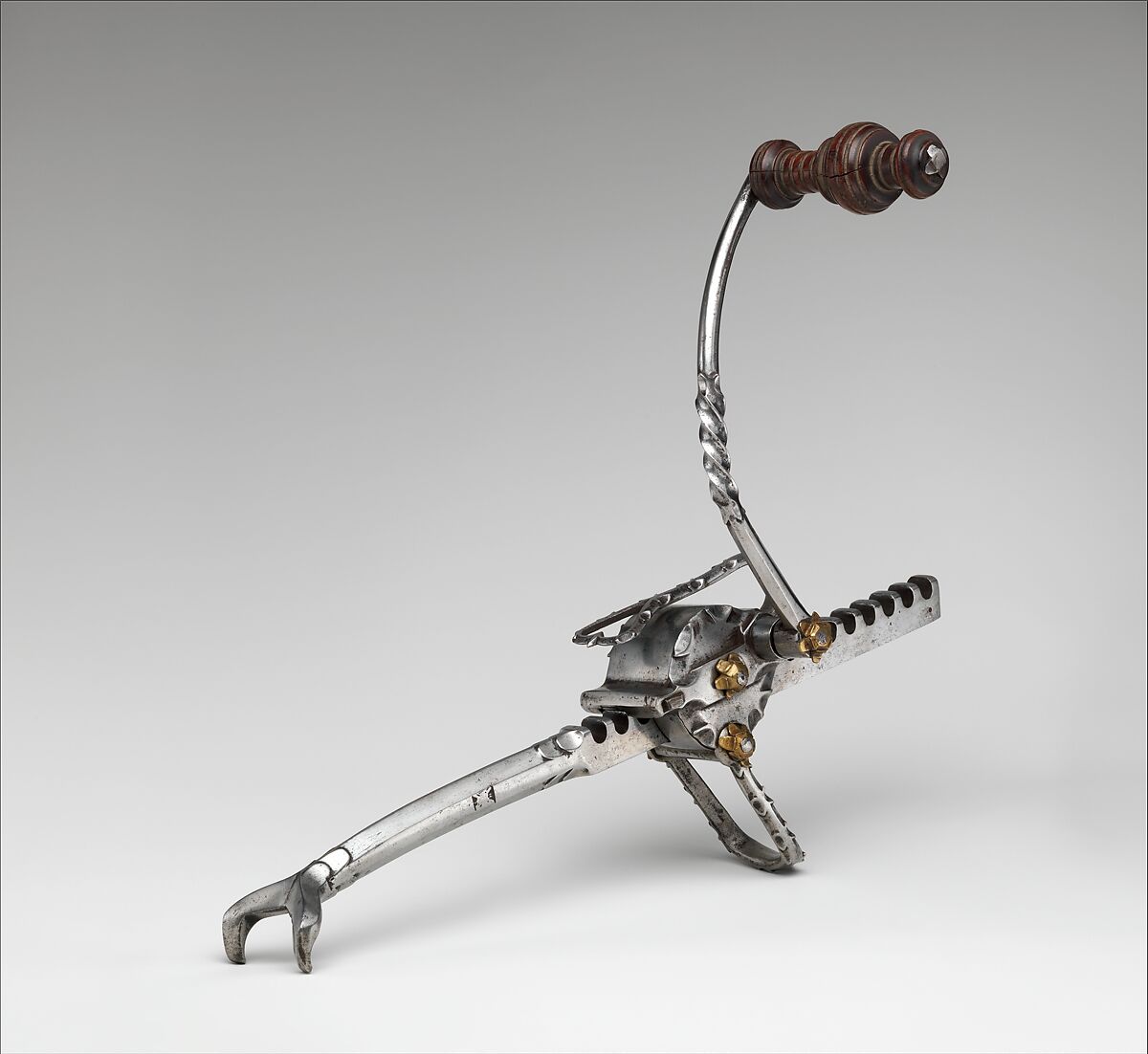Cranequin from the Armory of Emperor Maximilan I (reigned 1493/1508–19), Steel, wood (fruitwood, possibly pear), copper alloy, Western or Central European, the Netherlands or Austria