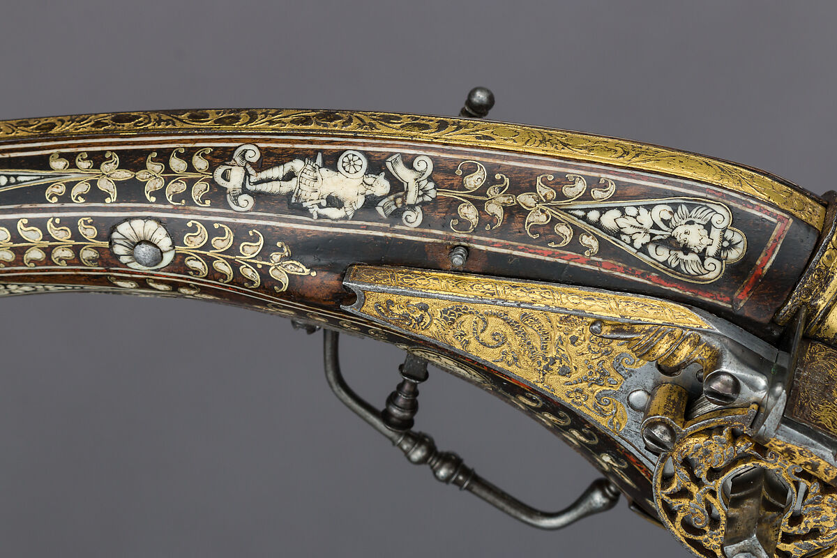 Pair of Wheellock Pistols with Matching Priming Flask/Spanner, Decoration on the stocks copied in part from engravings by Etienne Delaune (French, Orléans 1518/19–1583 Strasbourg), Steel, gold, silver, brass, wood (walnut), staghorn, brass wire, pigment, French