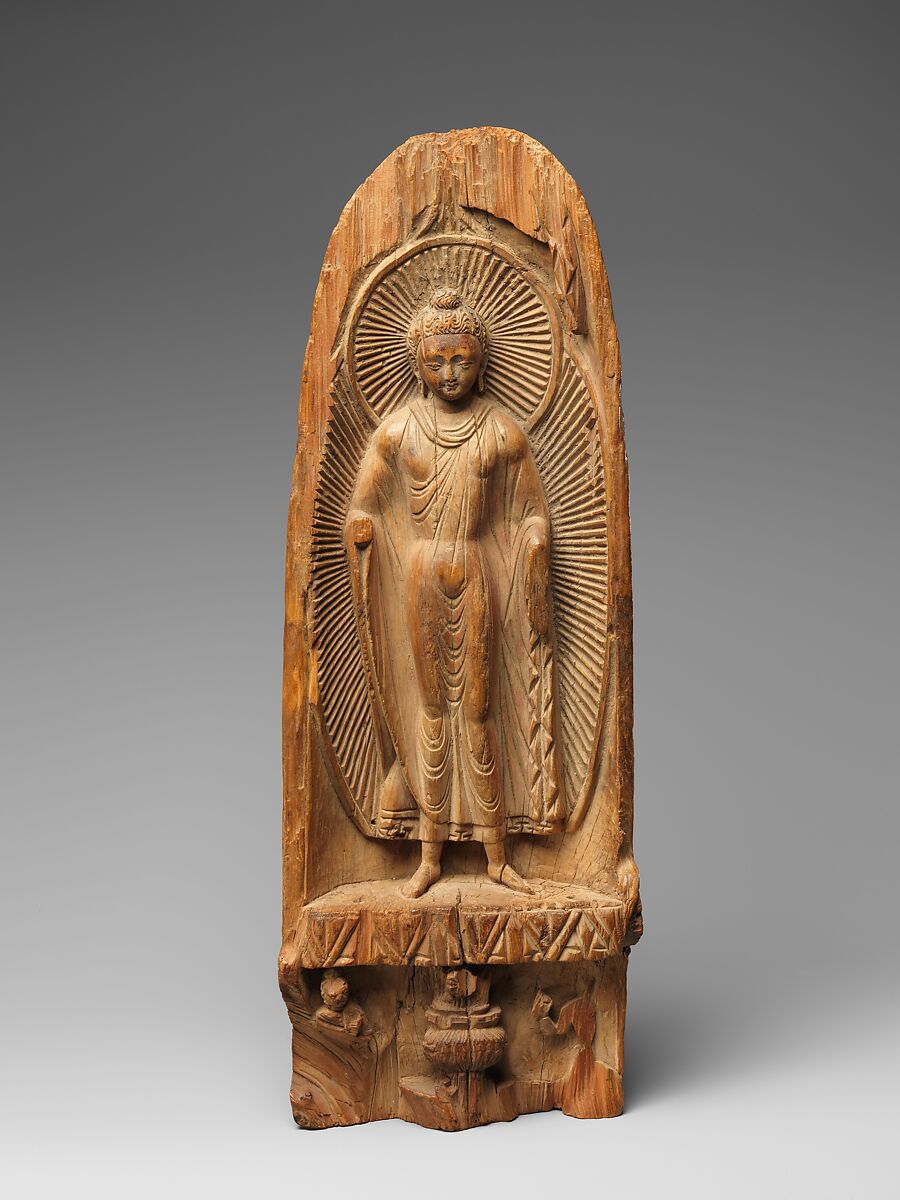 Buddha with radiate halo and mandorla, Juniper wood with traces of color and gold, China (Xinjiang Autonomous Region, Turfan area)