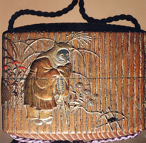 Case (Inrō) with a Fox from the Kyōgen Play "The Fox Hunter" (Tsurigitsune) (obverse); Haystacks and Stream from the Kyōgen Play "Hakuzosu" (reverse), Shibata Zeshin (Japanese, 1807–1891), Gold and colored lacquer on wood
Signed: Zeshin
Ojime: carved wooden dragon (signed: Ichiryūsai Furuta)
Netsuke: ceramic figure of Kaduzōsu (signed: Eiraku), Japan