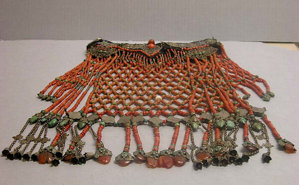 Headdress that hangs over face