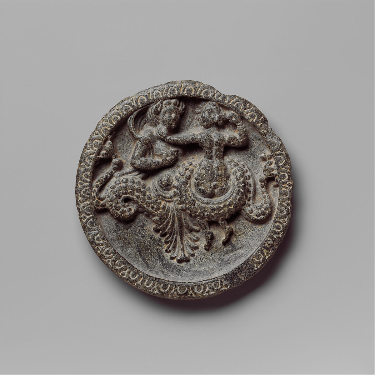 Dish with Marine Creature and Couple, Schist, Pakistan (ancient region of Gandhara)