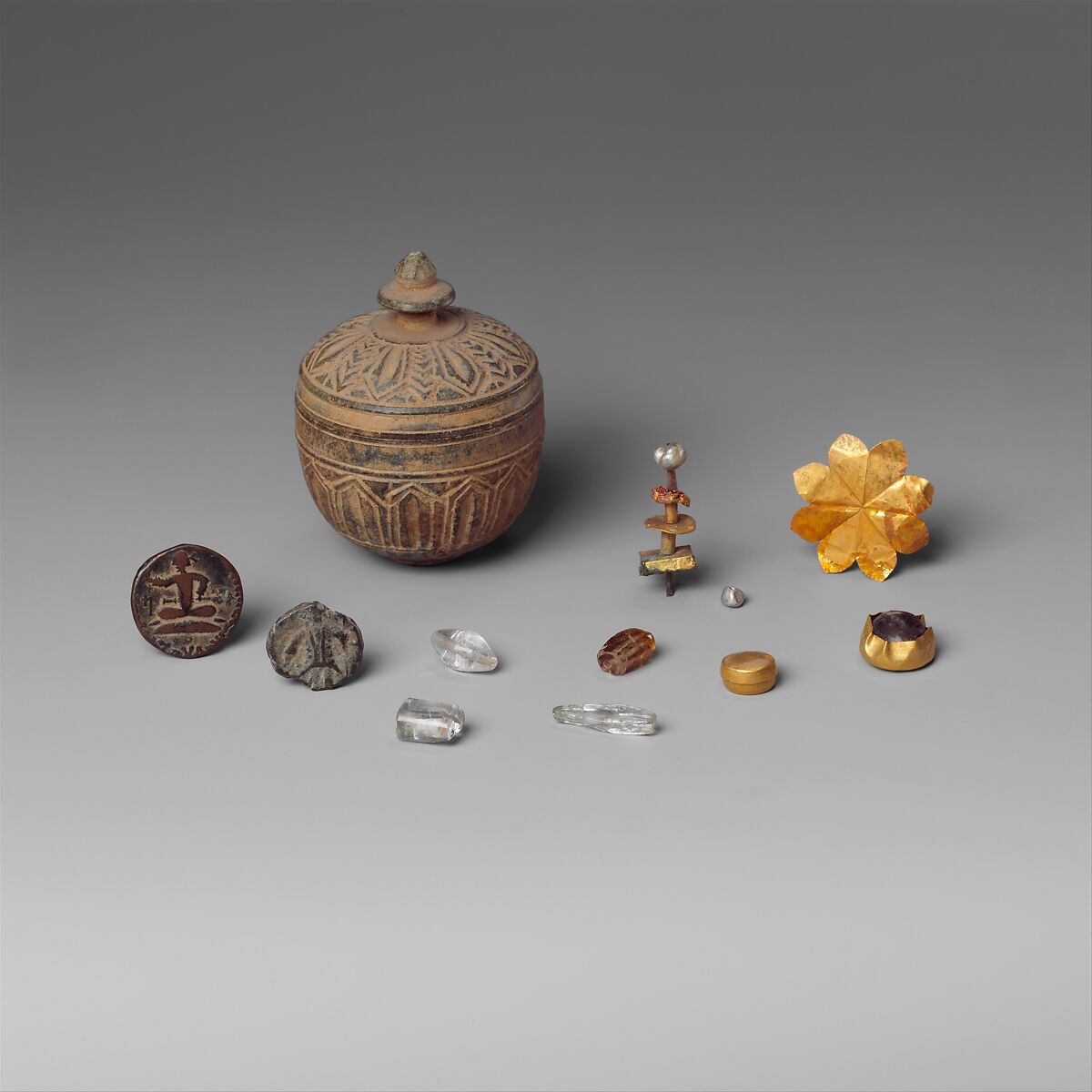 Reliquary with Contents, Schist with objects of copper, gold, rock crystal, and pearl objects, Pakistan (ancient region of Gandhara) 