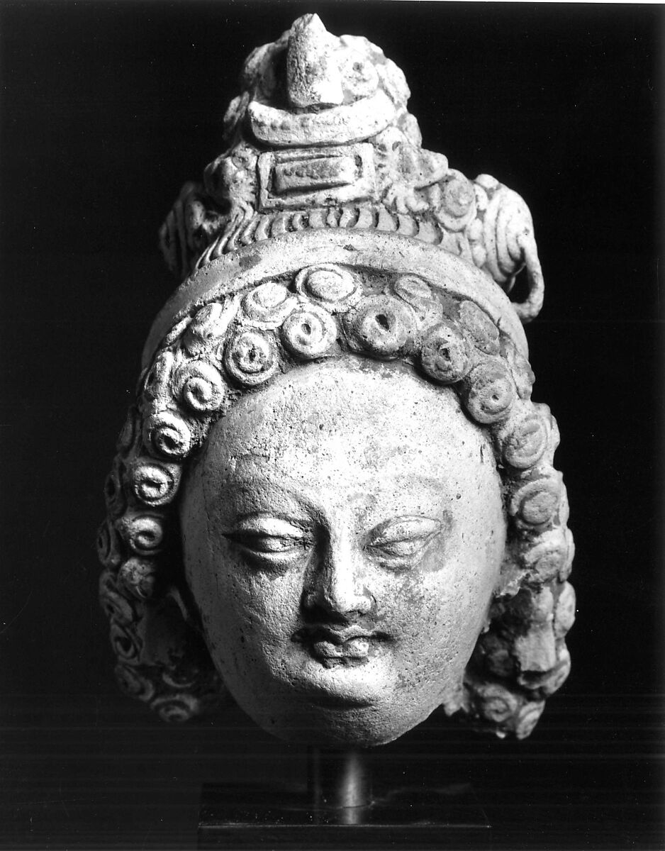 Head, Stucco with traces of gilt and paint, China 