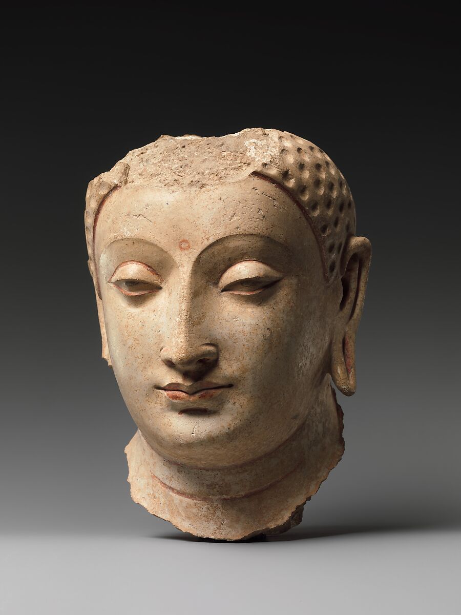 Head of Buddha, Stucco with traces of paint, Afghanistan (probably Hadda)