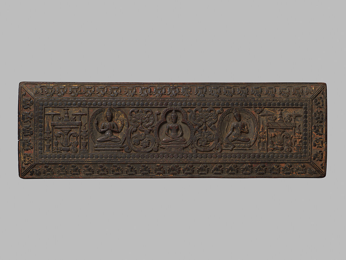 Manuscript Cover with Prajnaparamita Attended by Sadakshari Lokeshvara and a Tara, Wood with traces of gilding and color, Tibet 