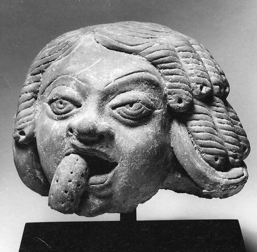 Head of a Man, Perhaps Eating a Fruit, Terracotta, India 