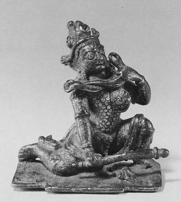 A Demon Victim of Durga's Wrath, Gilt copper, Nepal (Kathmandu Valley) 