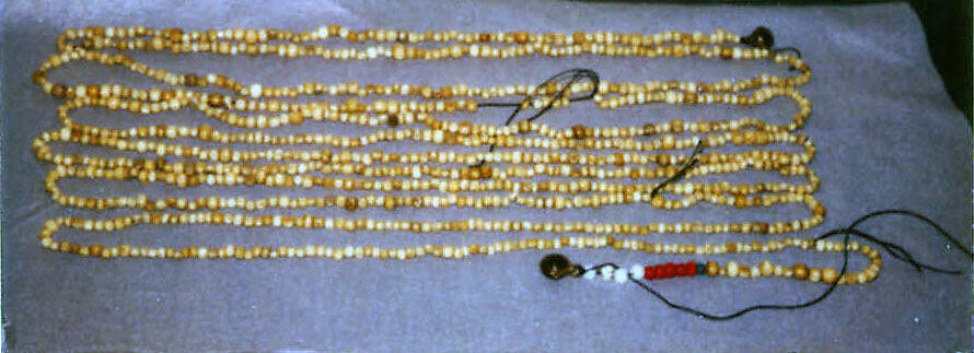 Group of Beads from an Apron and Two Bells, Bone; glass; copper, Tibet 