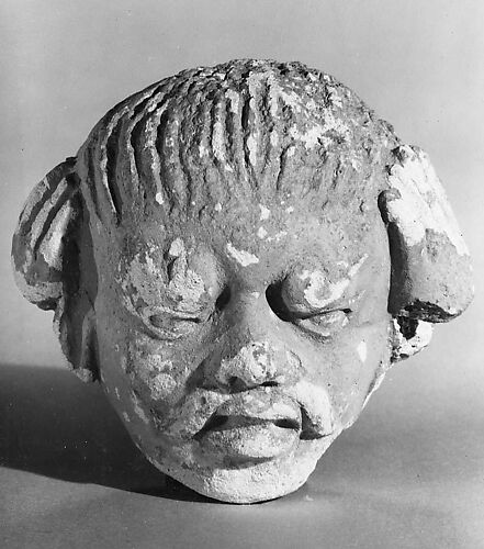 Head of a Male Figure with a Mustache