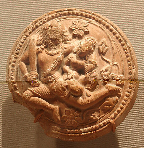 Rondel with a Racing Male Deity Cradling His Consort (Probably Shiva and Parvati)