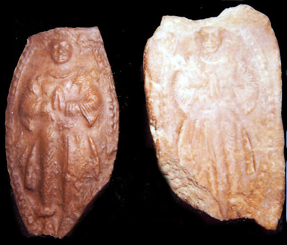 Mold and Impression for an Adorning Figure