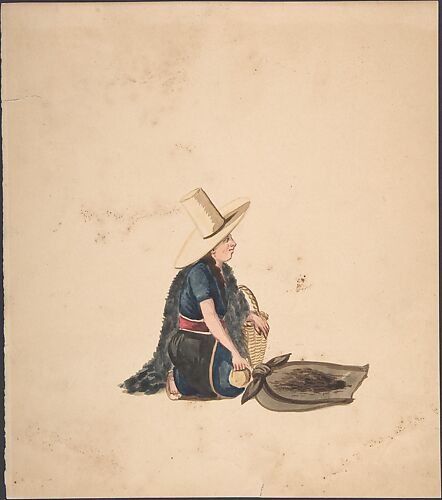 A Woman Kneeling Selling Produce