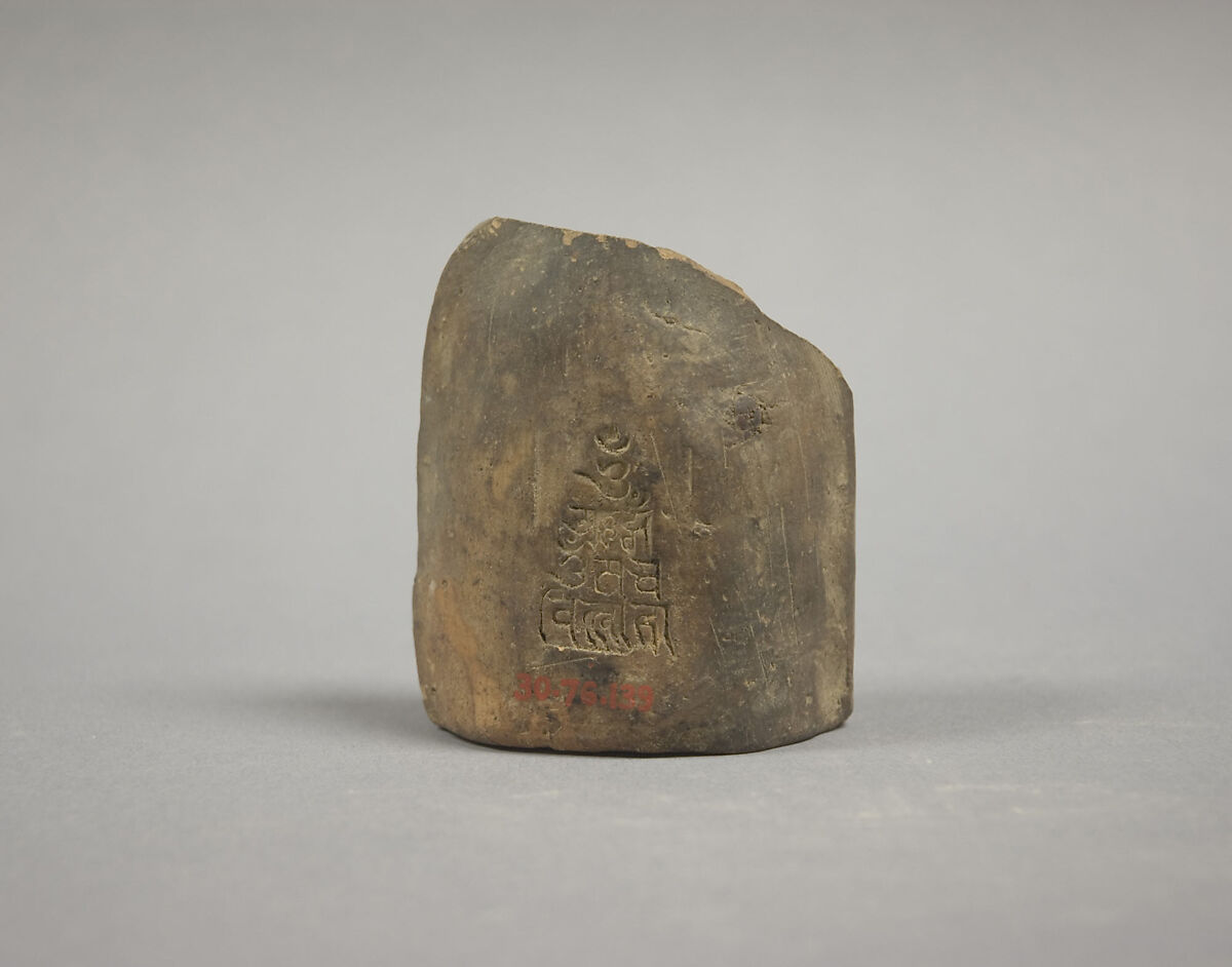 Seated Buddha, Unglazed pottery, Tibet