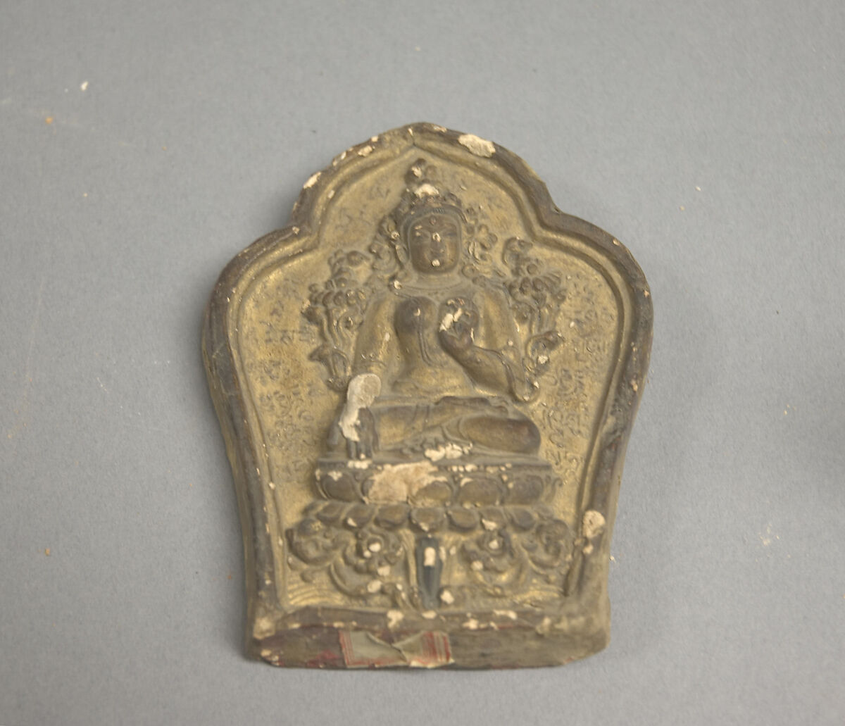 Votive Plaque with White Tara, Black clay with color and gilt, Tibet 