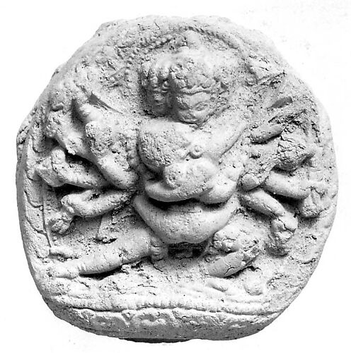 Votive Plaque with Three-Headed Deity