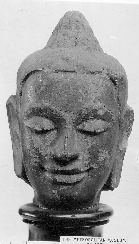 Head of a Buddha, Stone with remains of lacquer gilding, Cambodia 